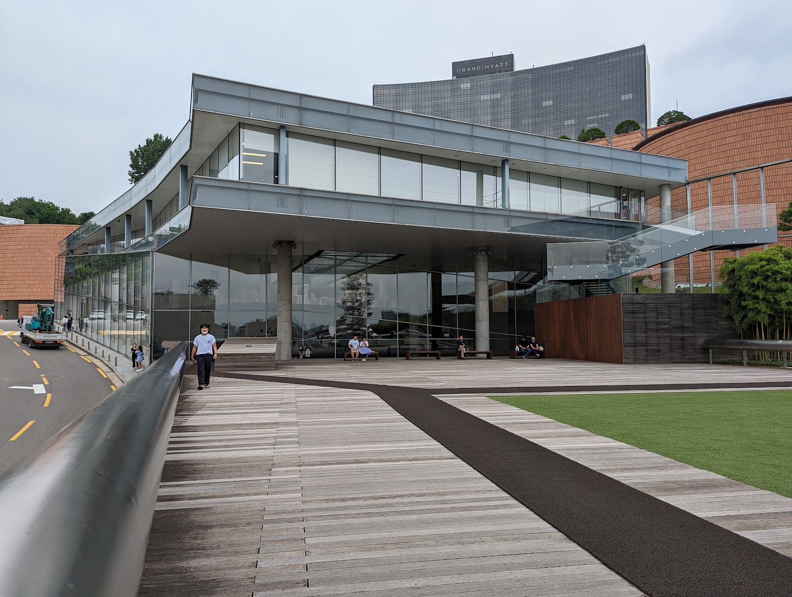Leeum Museum — the interior galleries with light filtering through Nouvel's dark steel volumes