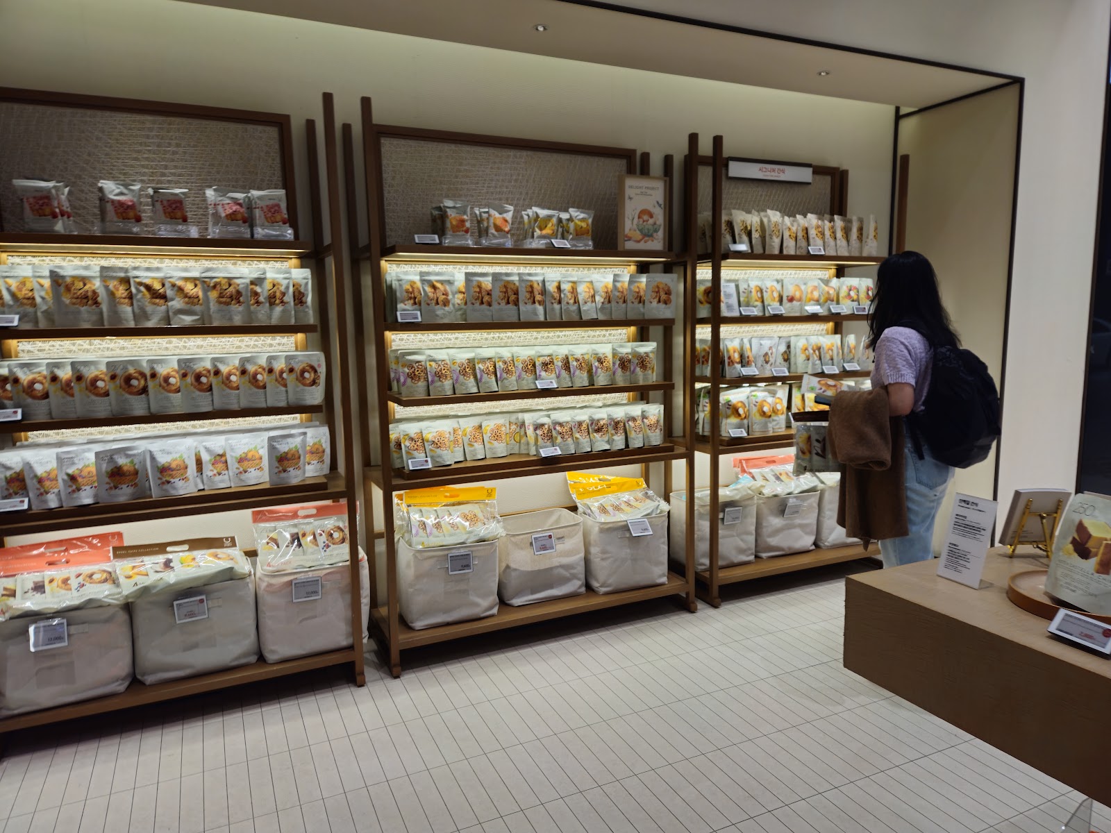 Olive Young interior with K-beauty product displays and consultation areas