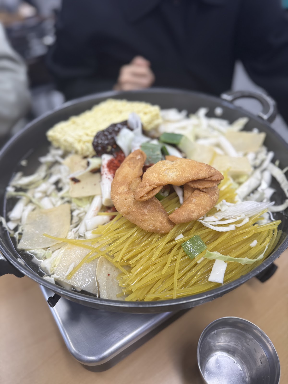 Raw ingredients arranged in the pan before cooking