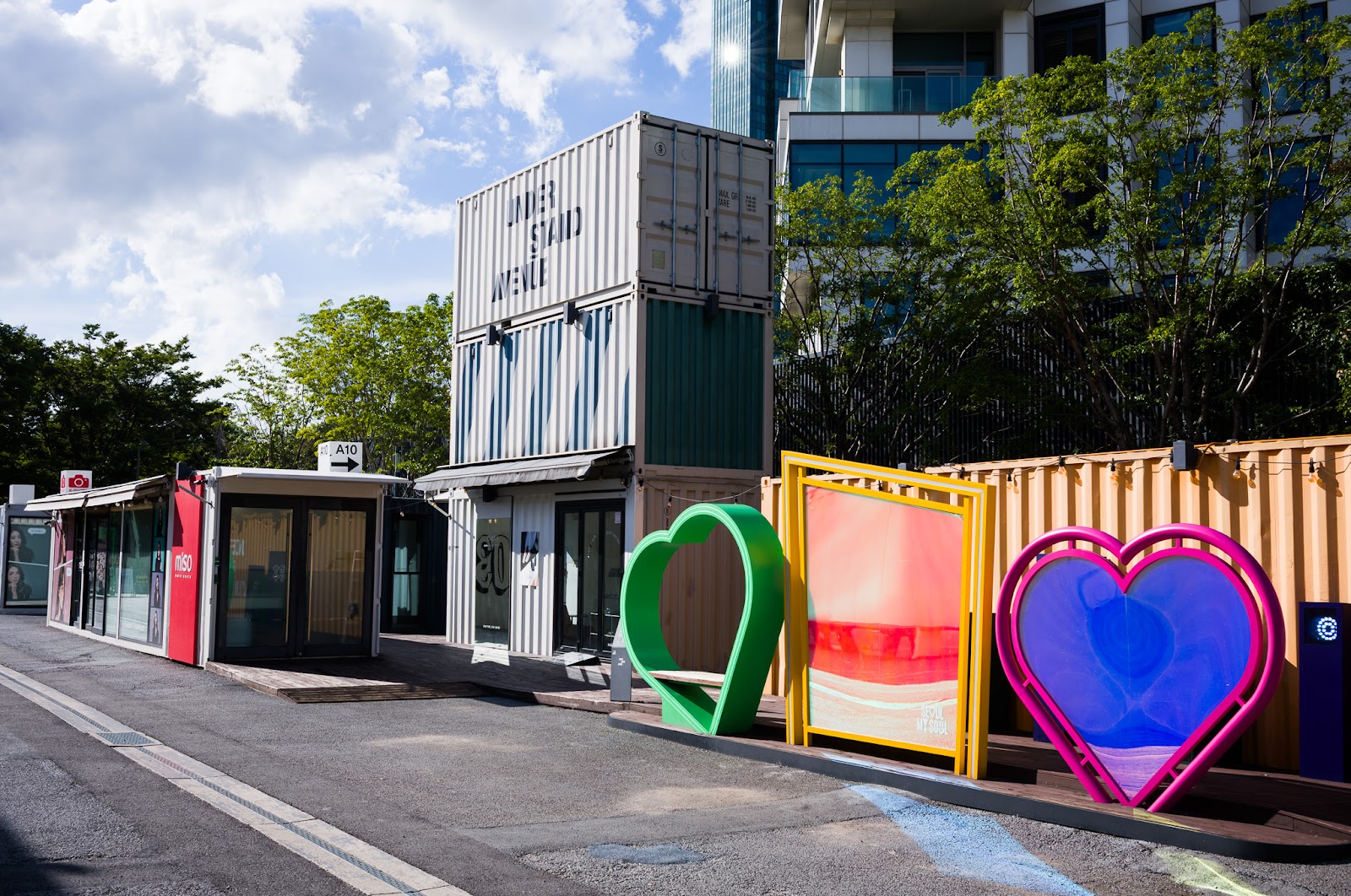 Understand Avenue — interior pathways between containers with independent shops and studios